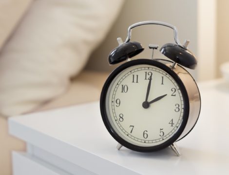 Alarm clock on the nightstad